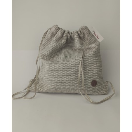 Bolso solidario estilo mochila confeccionado en loneta tricolor